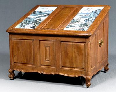 Appraisal: Lidded Continental storage bin frame-and-panel construction scrolled feet flanking scalloped