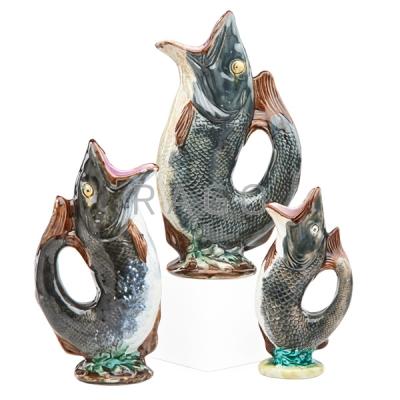 Appraisal: ENGLISH MAJOLICA GURGLE JUGS Condition Report