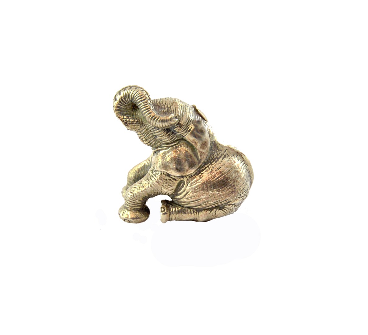 Appraisal: A Zimbabwean model of a seated baby elephant by Patrick