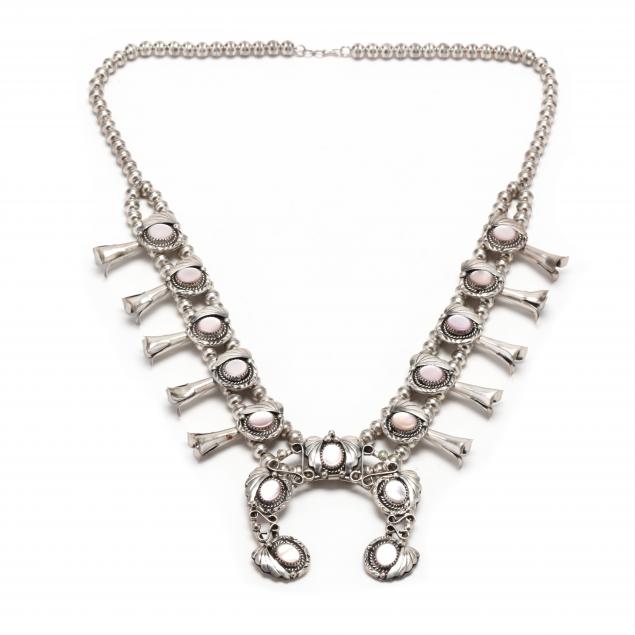 Appraisal: SILVER AND MOTHER-OF-PEARL SQUASH BLOSSOM NECKLACE The central naja bezel