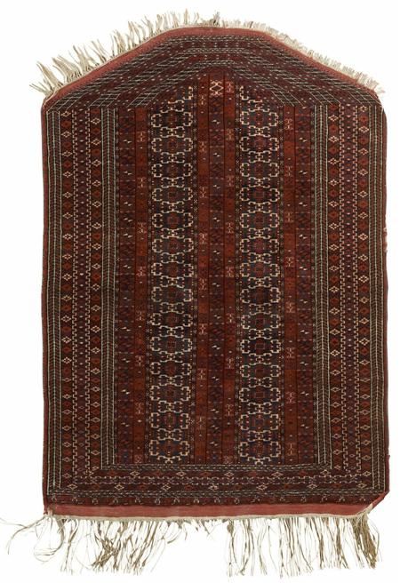 Appraisal: A Tekke prayer rug the field with two main columns