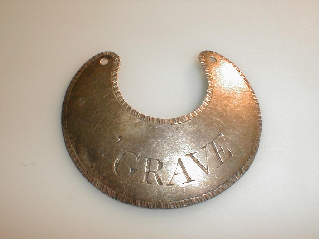 Appraisal: A George III silver decanter label of crescent shape 'Grave