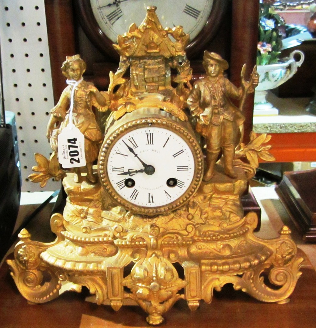 Appraisal: A gilt spelter mantel clock