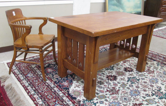 Appraisal: OAK LIBRARY TABLE AND CHAIR American c featuring a rectangular