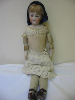 Appraisal: A Simon Halbig bisque swivel shoulder head girl doll with