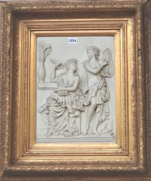 Appraisal: A modern faux marble wall plaque cast in relief with