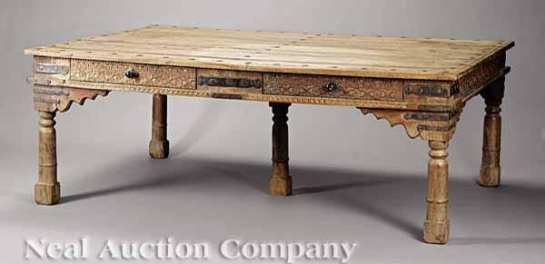 Appraisal: A Spanish or Portuguese Carved Walnut Table plank top with