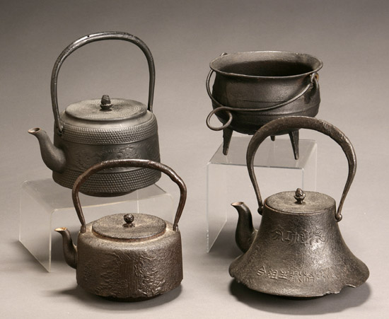 Appraisal: Group of Six Japanese Iron Teapots Tetsubin and a Cauldron