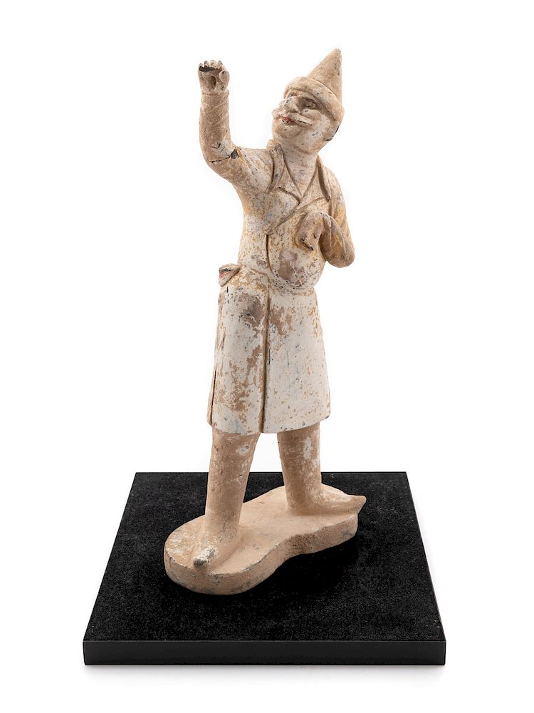 Appraisal: A Pottery Figure of a Groom Height in cm A