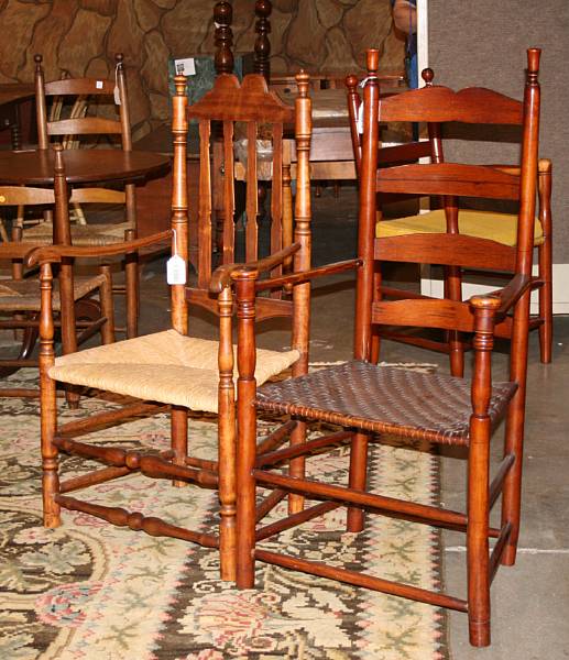 Appraisal: Two American mixed wood ladder back armchairs late th early