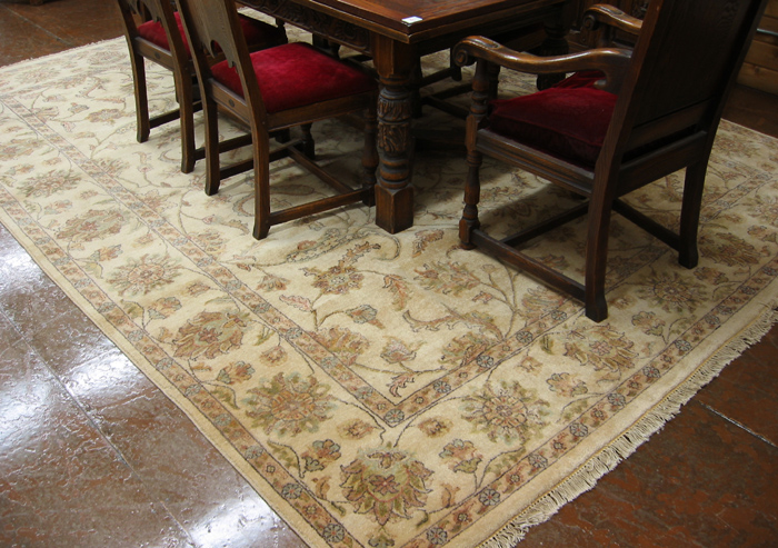 Appraisal: HAND KNOTTED ORIENTAL ROOM-SIZE CARPET Pakistani-Persian overall scrolling floral raceme