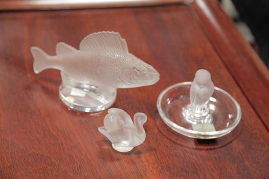 Appraisal: THREE LALIQUE CRYSTAL ANIMALS A fish on a round base