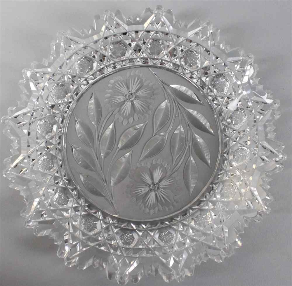 Appraisal: CUT AND ENGRAVED GLASS DISH the center with cut flowers