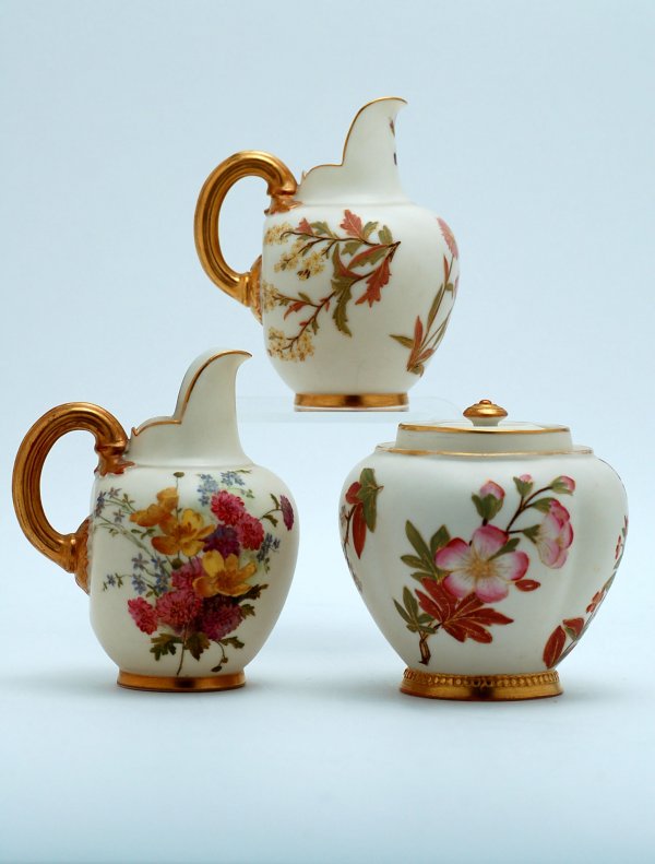 Appraisal: Two Royal Worcester creamers and a covered jar all with