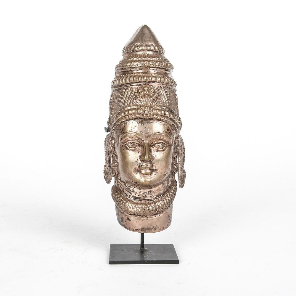 Appraisal: SILVER MASK COVER HINDU GODDESS PARVATI WITH STAND High relief