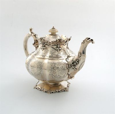 Appraisal: A Victorian silver tea pot by John and George Angell