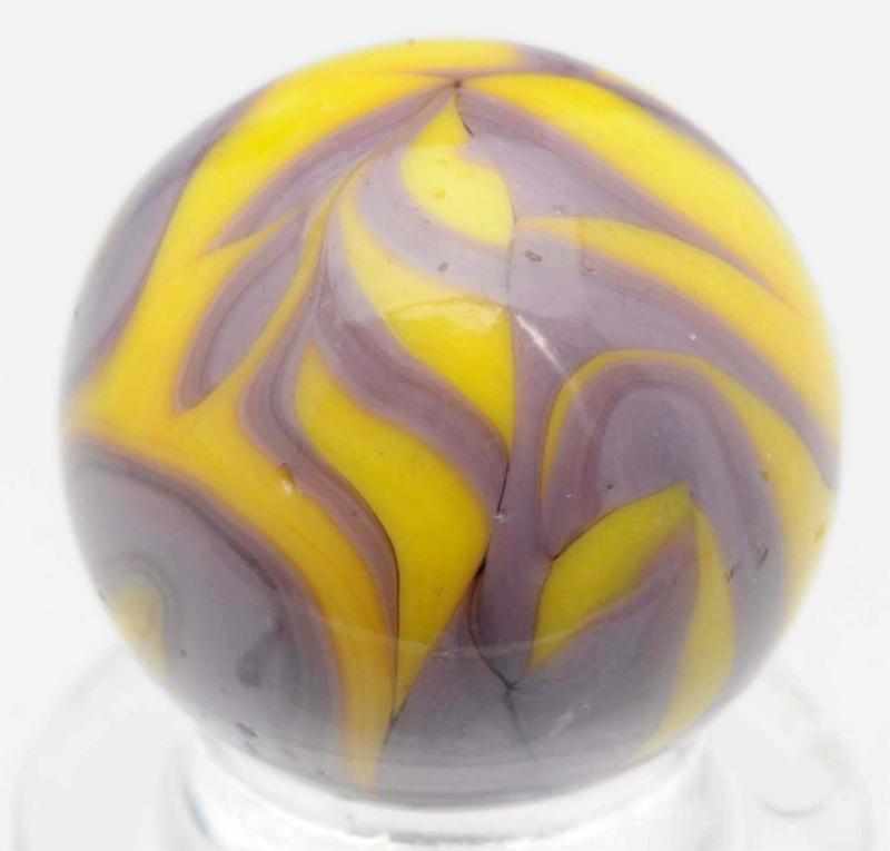 Appraisal: Christensen Agate -Color Flame Marble Yellow base with lavender flames