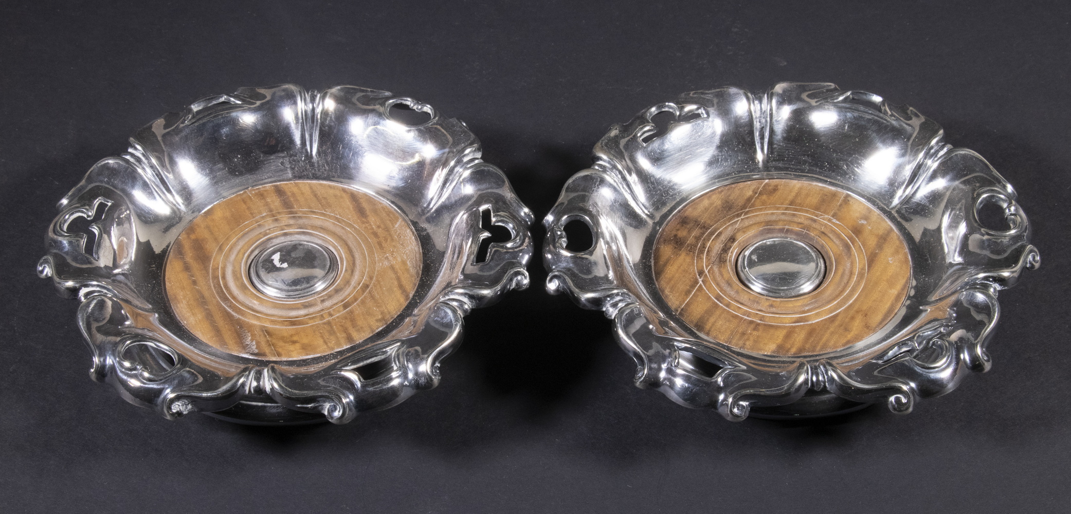 Appraisal: PR ELKINGTON CO SILVER-PLATE WINE COASTERS Pair of Mid- th