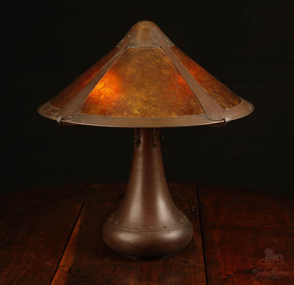 Appraisal: An Aurora Studios hammered copper mica lamp An Aurora Studios