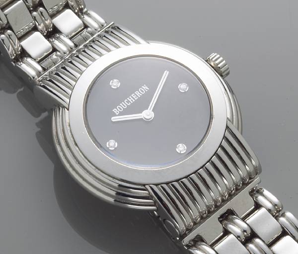 Appraisal: A lady's wristwatch with diamond accents accompanied by original fitted