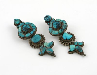 Appraisal: A pair of Tibetan silver and turquoise earrings each inset