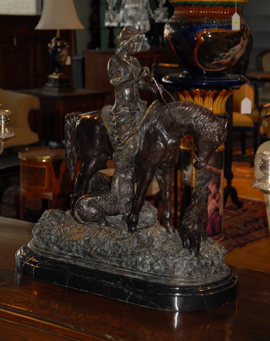 Appraisal: A Large Bronze Statue of Girl on Horse with Dogs