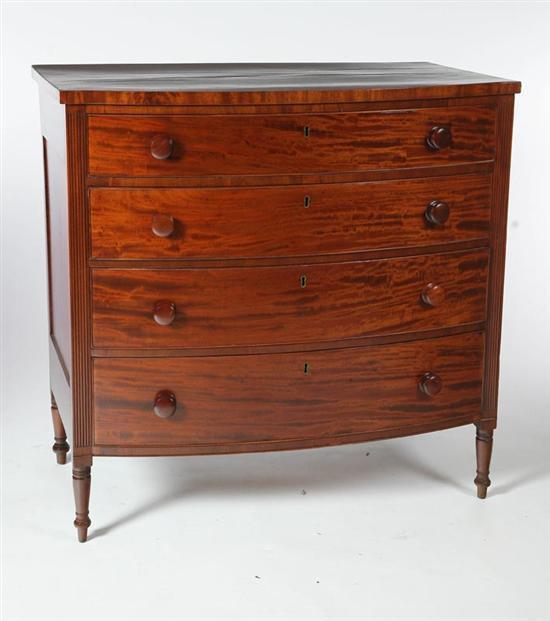 Appraisal: SHERATON BOWFRONT CHEST OF DRAWERS American early th century mahogany