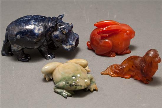 Appraisal: Chinese carved agate rabbit carved hardstone frog carved amber dog