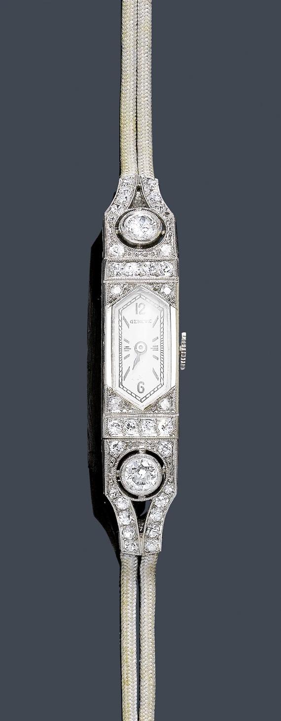 Appraisal: A LADY'S DIAMOND WRISTWATCH GLYCINE circa Platinum Barrel-shaped case integrated