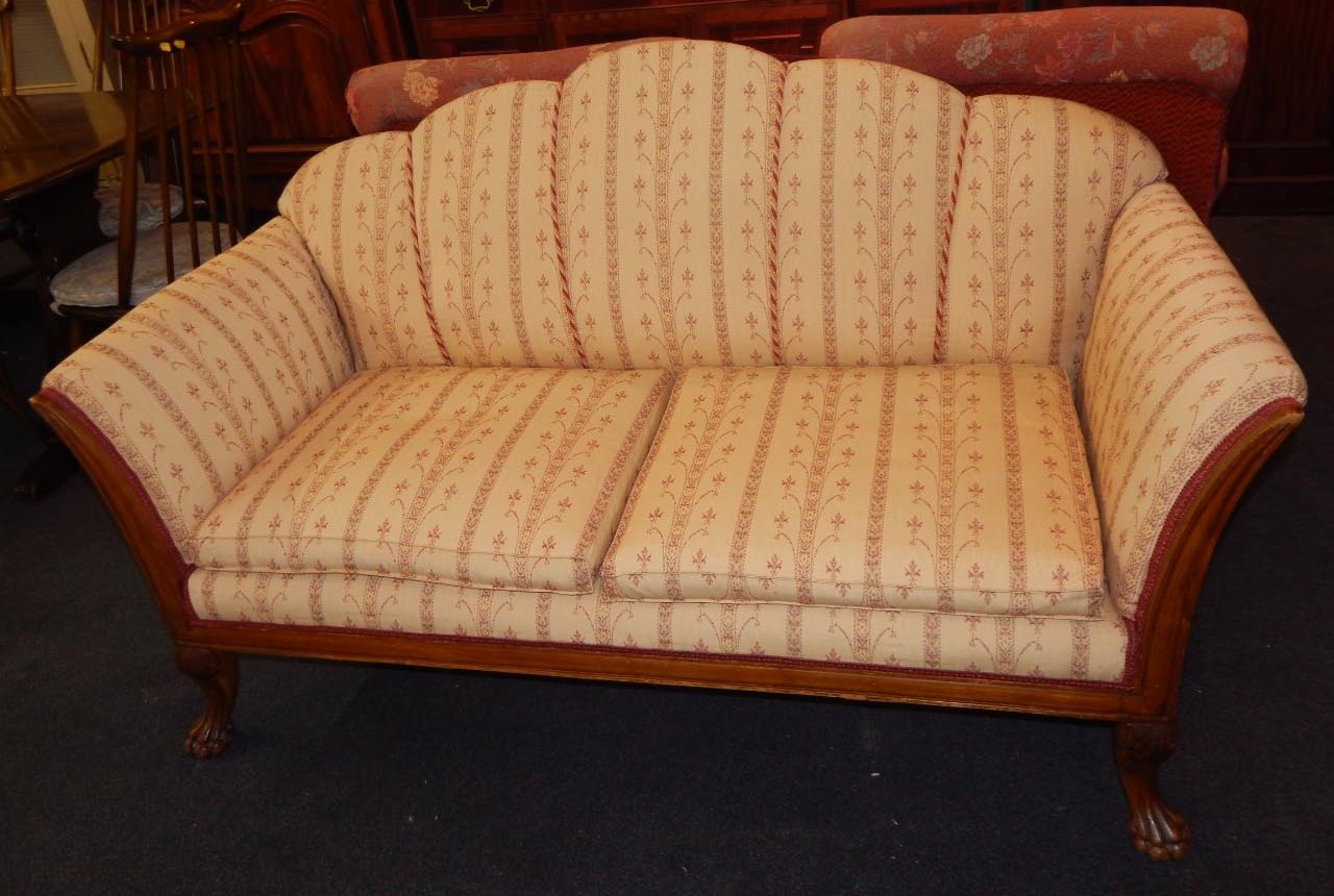 Appraisal: An early thC mahogany two seat sofa upholstered in regency