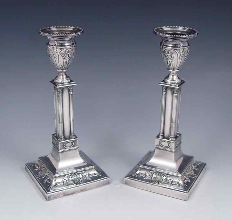 Appraisal: THOMAS BRADBURY SONS SILVERPLATE CANDLESTICKS Pair Greek revival single light