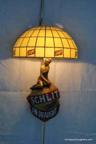 Appraisal: Schlitz Beer Lighted Wall Sconce Sign Is an authorized and