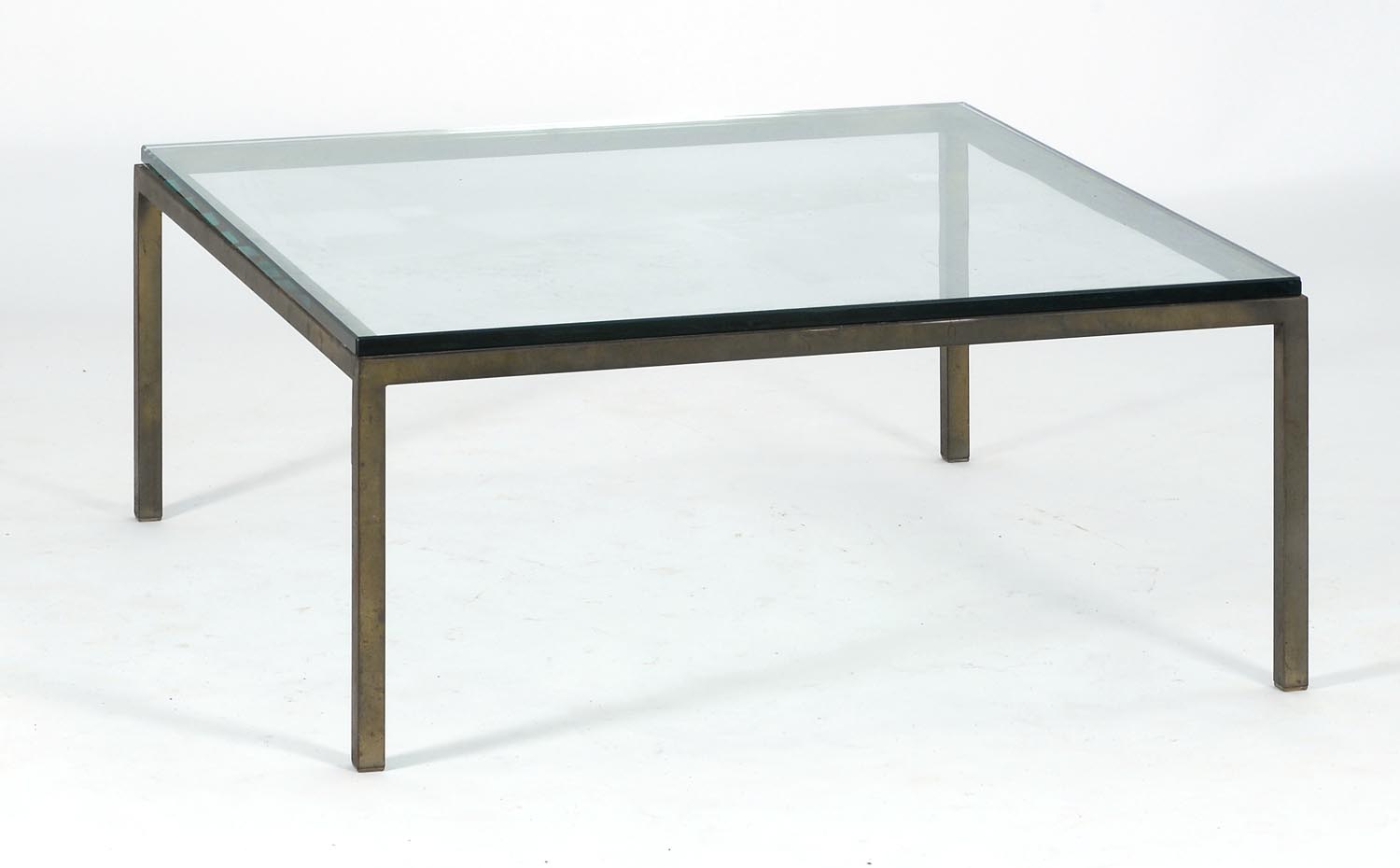 Appraisal: MODERN GLASS-TOP COFFEE TABLE with metal base Top x Height