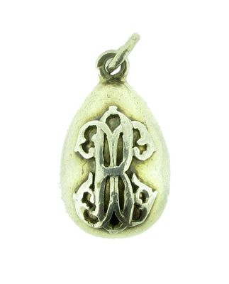 Appraisal: A Russian silver egg form pendant Applied with initials Russian