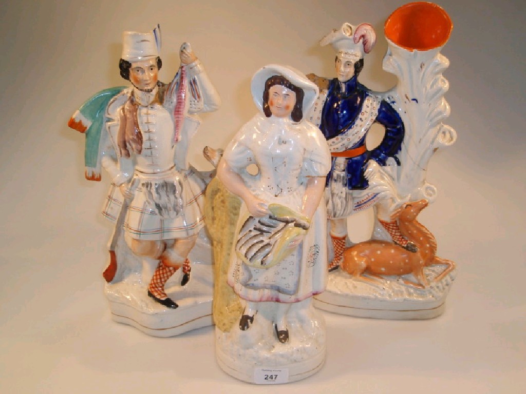 Appraisal: A thC Staffordshire pottery figure of a fisherwoman cm high