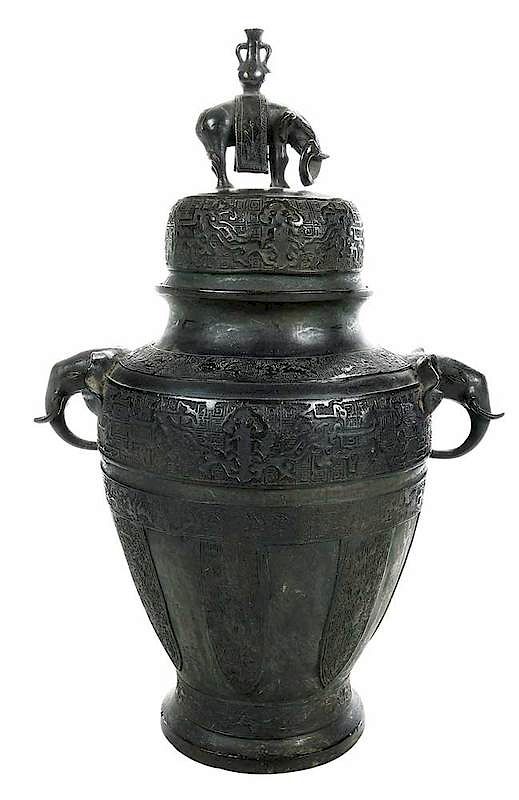 Appraisal: Chinese Bronze Covered Jar with Elephants th century baluster shape