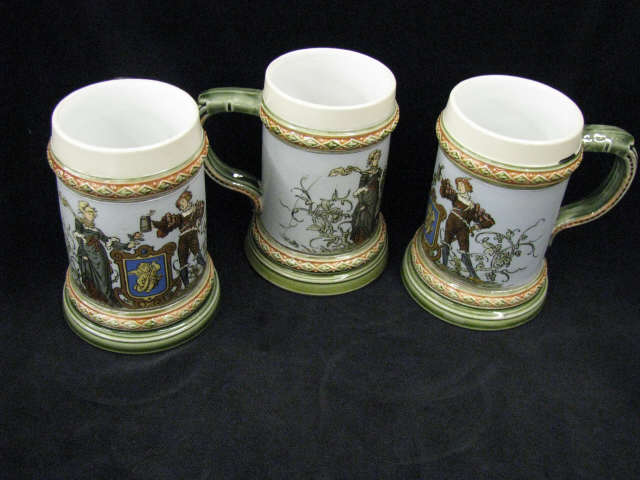 Appraisal: Mettlach Steins etched with lovers man holding a stein signed