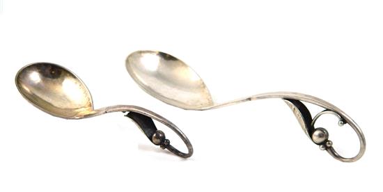 Appraisal: SILVER Pair of Georg Jensen sterling silver spoons shaped handles