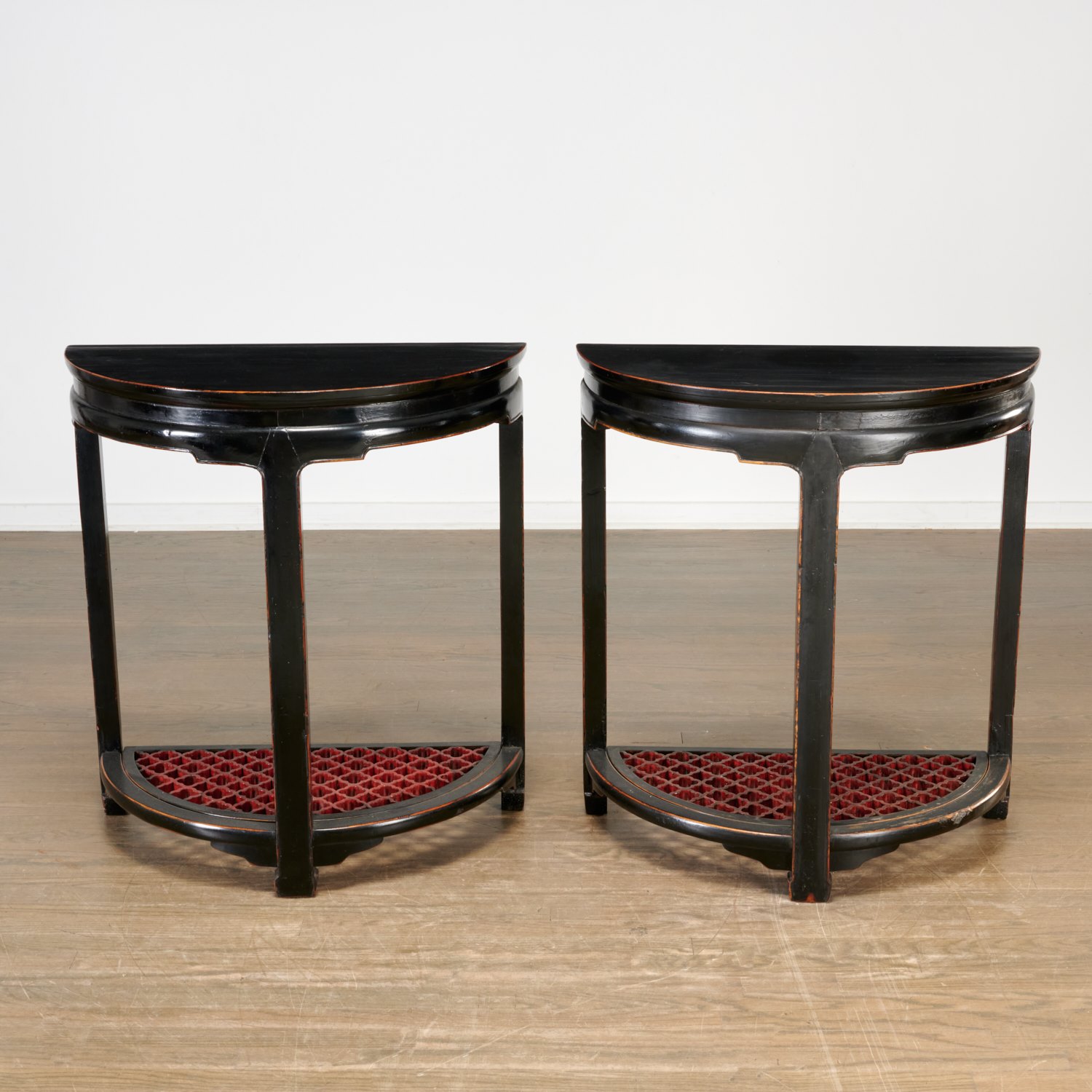 Appraisal: PAIR CHINESE MODERN LACQUERED DEMILUNE CONSOLES th c red and