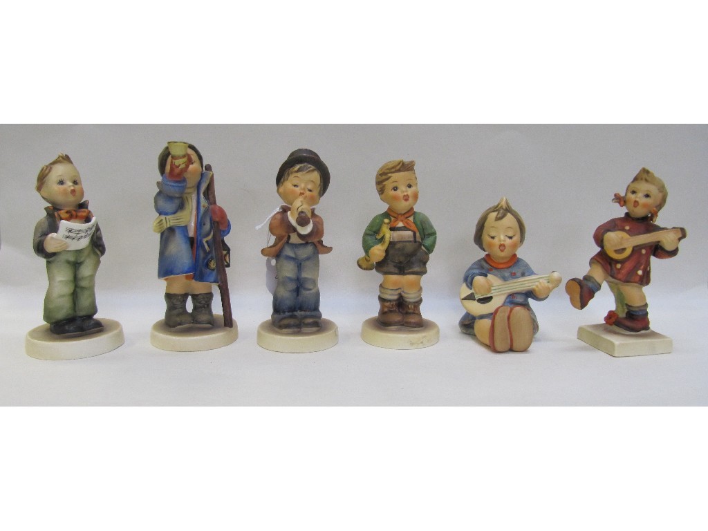 Appraisal: Six Hummel figures including Joyful Happiness Serenade Trumpet Boy TMK