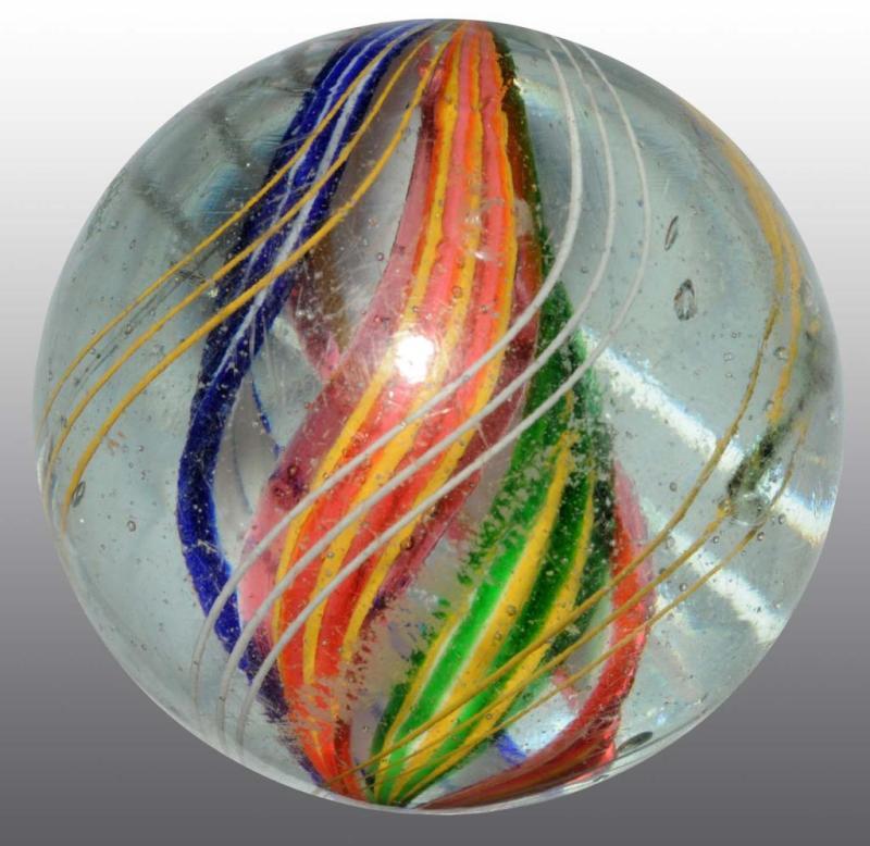 Appraisal: Multi-Colored Divided Core Swirl Marble Description Alternating outer bands of