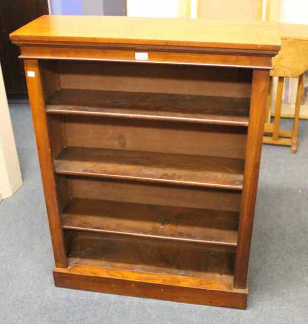 Appraisal: A VICTORIAN MAHOGANY OPEN BOOKCASE of simple form with shaped