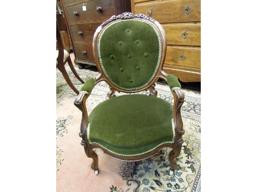 Appraisal: A Victorian child's open armchair with serpentine upholstered seat and