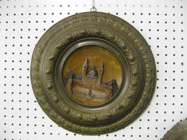 Appraisal: Pair of German Plaques terracotta pottery cityscapes in ornate brass