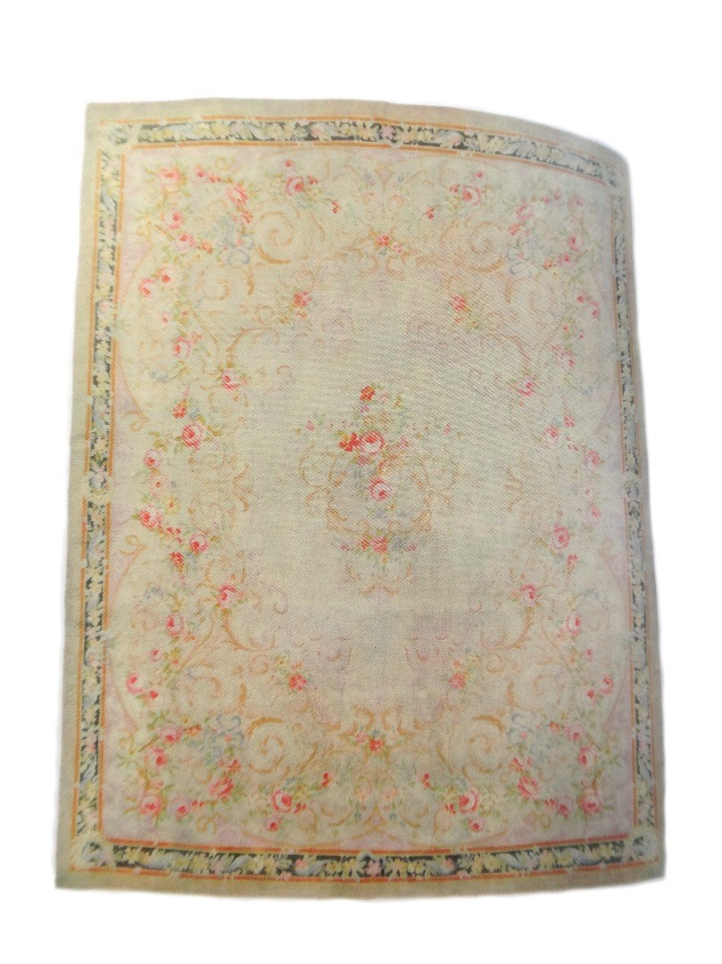 Appraisal: A large Savonnerie carpet cream main field with central rose