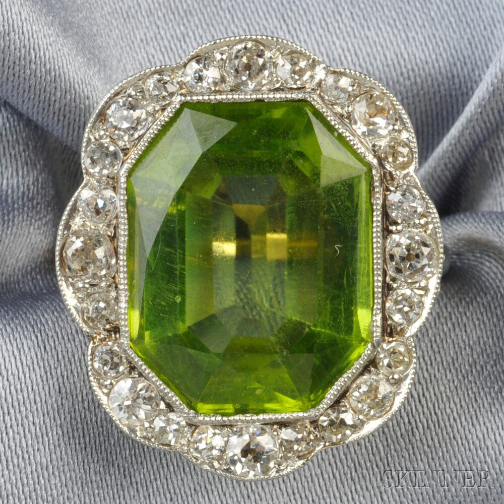 Appraisal: Edwardian Peridot and Diamond Ring bezel-set with a fancy-cut peridot