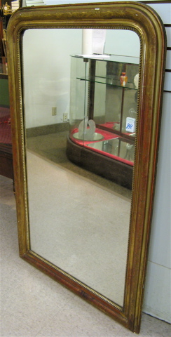 Appraisal: GERMAN AUSTRIAN RECTANGULAR WALL MIRROR with rounded shoulders in gold