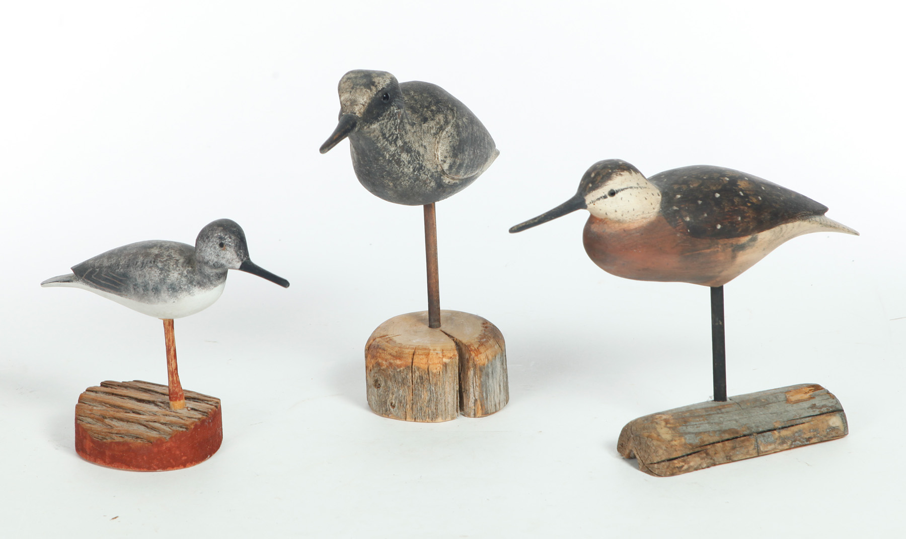 Appraisal: THREE SHOREBIRD DECOYS American late th-early st century All are