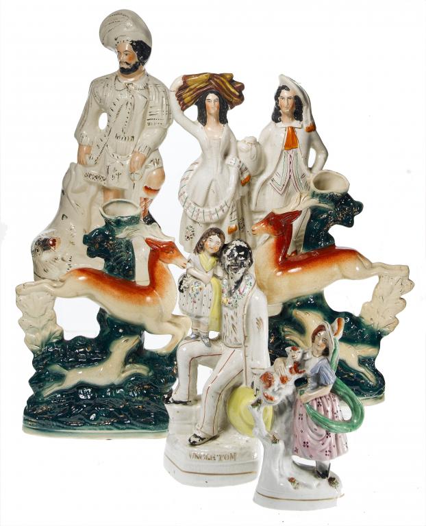 Appraisal: A STAFFORDSHIRE EARTHENWARE GROUP OF UNCLE TOM AND EVA THREE