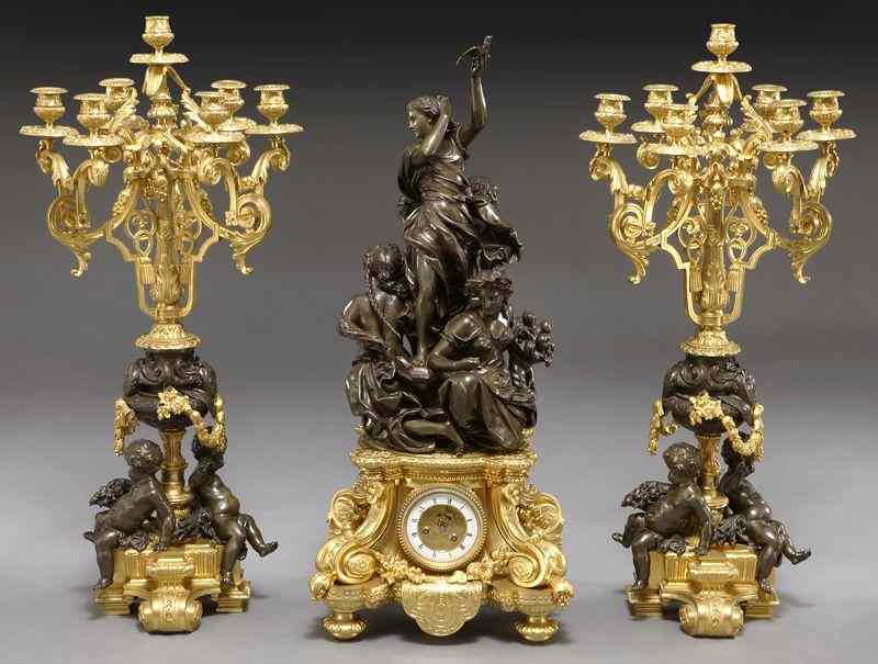 Appraisal: Pc Louis XV style bronze clock garniture set the clock